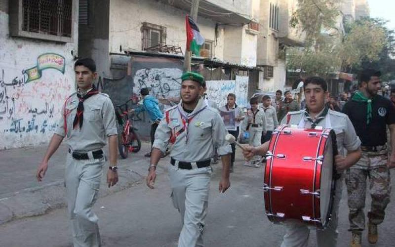 بالصور:مسير كشفي بذكرى "السجيل" بالوسطى