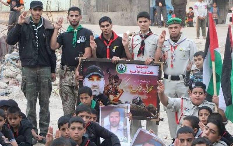 بالصور:مسير كشفي بذكرى "السجيل" بالوسطى