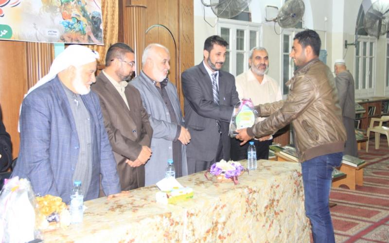 بالصور: "حماس" تكرم شهداء "حجارة السجيل" بالمغازي