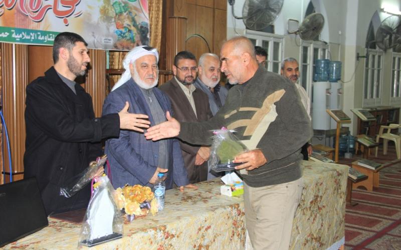 بالصور: "حماس" تكرم شهداء "حجارة السجيل" بالمغازي