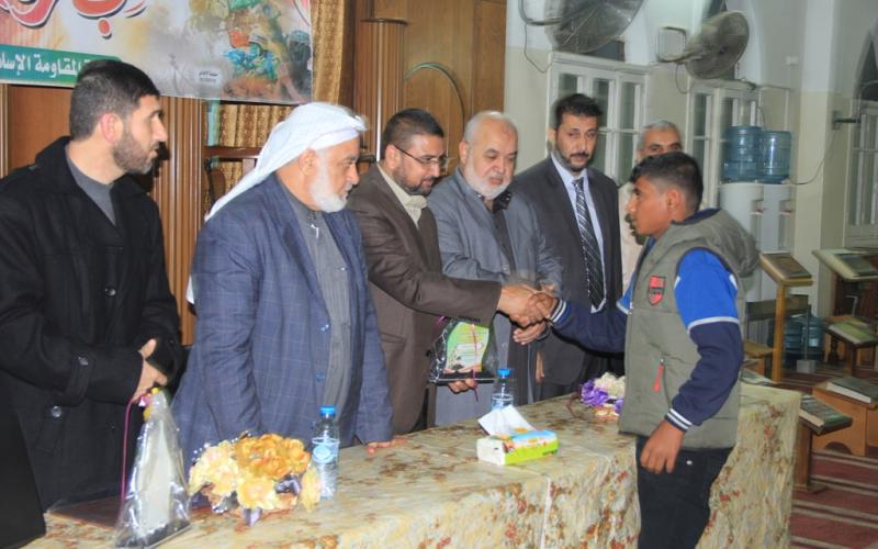 بالصور: "حماس" تكرم شهداء "حجارة السجيل" بالمغازي