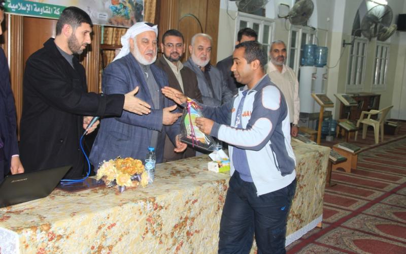 بالصور: "حماس" تكرم شهداء "حجارة السجيل" بالمغازي