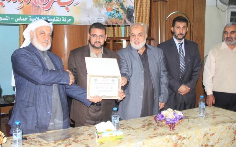 بالصور: "حماس" تكرم شهداء "حجارة السجيل" بالمغازي