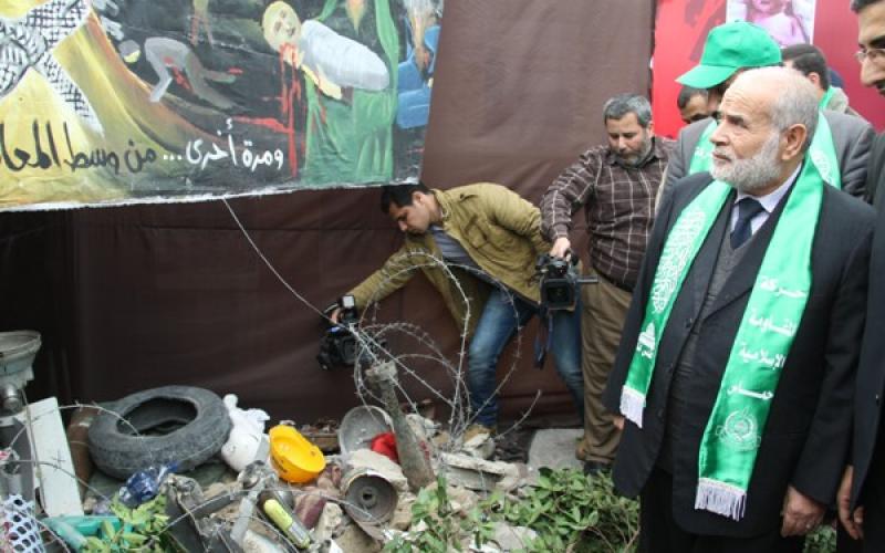 صور.. معرض "ذاكرة الفرقان بعيون السجيل"