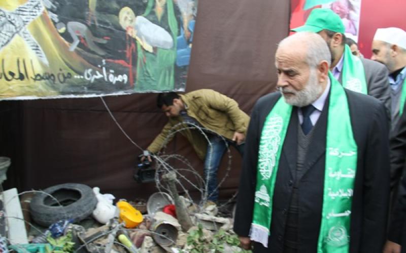 صور.. معرض "ذاكرة الفرقان بعيون السجيل"