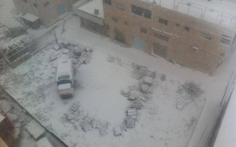 صور: القدس والضفة تكتسي بالأبيض
