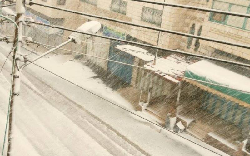صور: القدس والضفة تكتسي بالأبيض