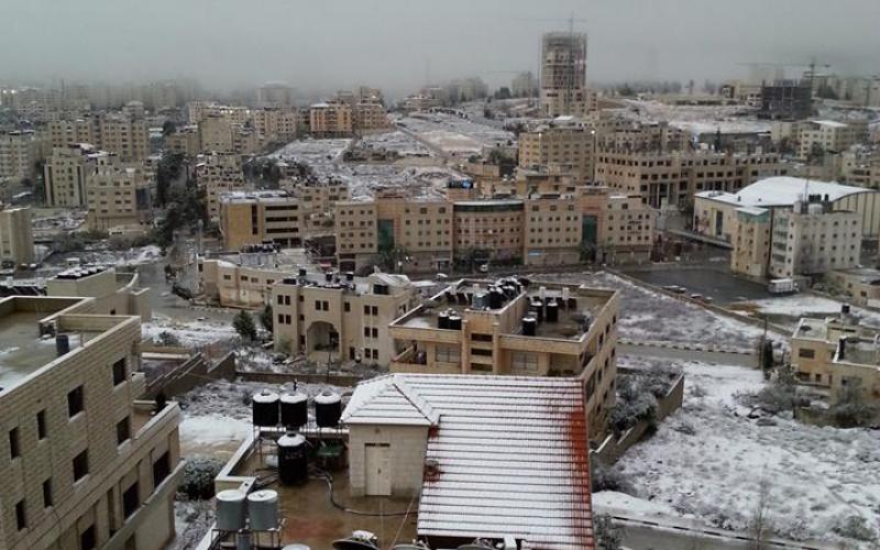 صور: القدس والضفة تكتسي بالأبيض