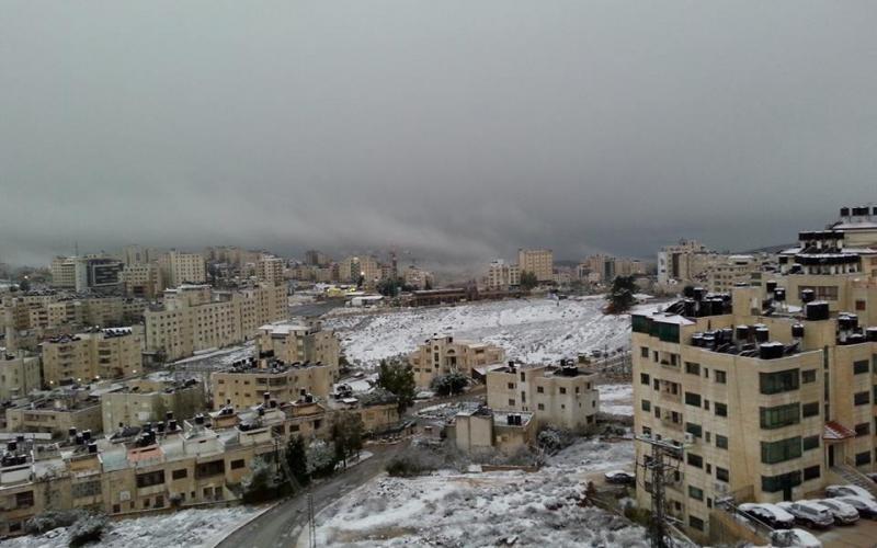صور: القدس والضفة تكتسي بالأبيض