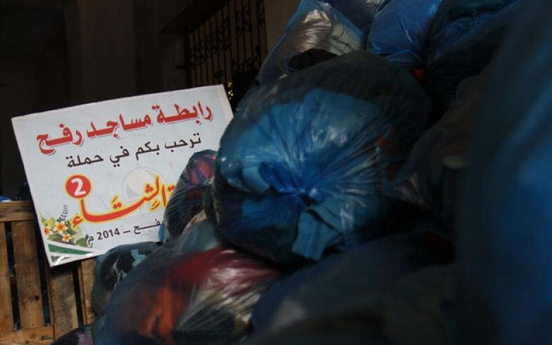 بالصور:"كسوة الشتاء" حملة محبة للأسر المستورة