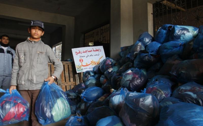 بالصور:"كسوة الشتاء" حملة محبة للأسر المستورة