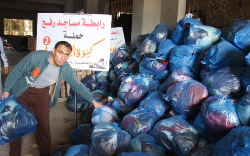 بالصور:"كسوة الشتاء" حملة محبة للأسر المستورة
