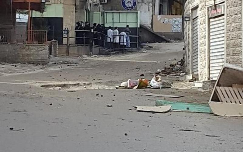 بالصور: هدم بناية ومواجهات عنيفة مستمرة بمخيم شعفاط‎
