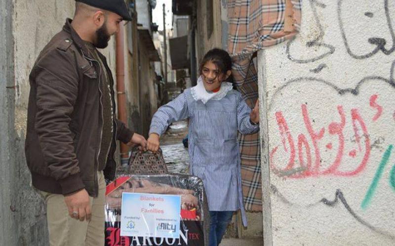 صور: توزيع كسوة الشتاء بالنصيرات