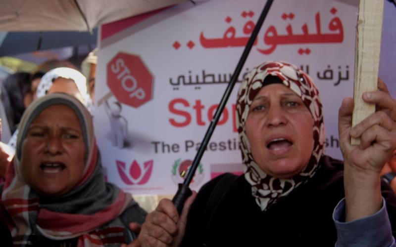 صور: وقفة نسوية بغزة لمناهضة العنف ضد المرأة