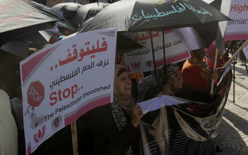 صور: وقفة نسوية بغزة لمناهضة العنف ضد المرأة