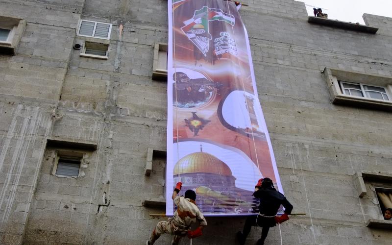 صور:عرض عسكري بمسيرة حماس بالوسطى