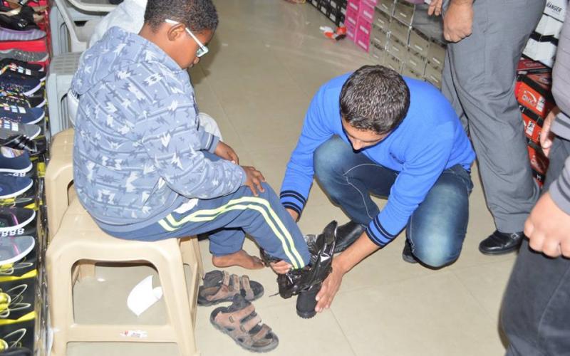 دار القرآن بالمغازي توزع كسوة الشتاء