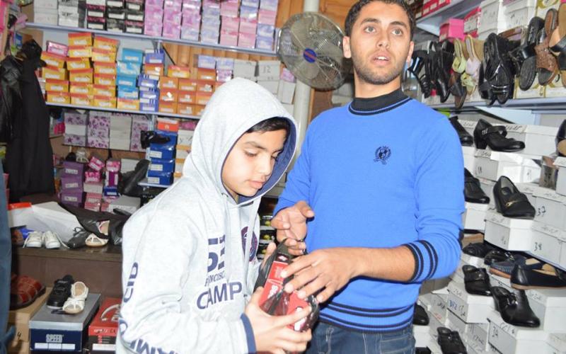 دار القرآن بالمغازي توزع كسوة الشتاء