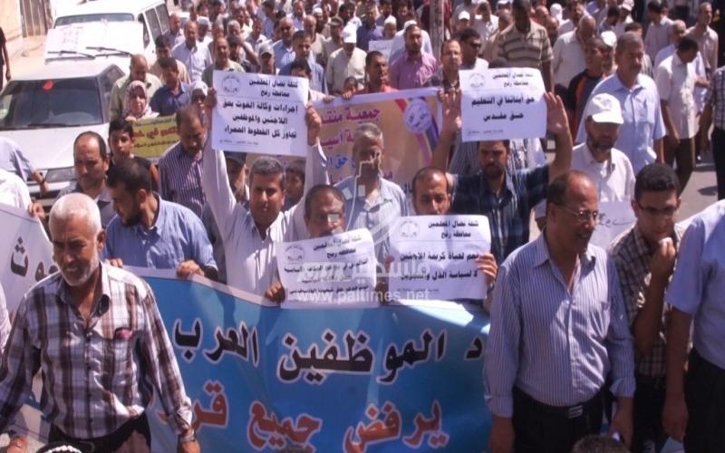 بالصور: وقفة برفح احتجاجًا على سياسة تقليصات الـ"أونروا"