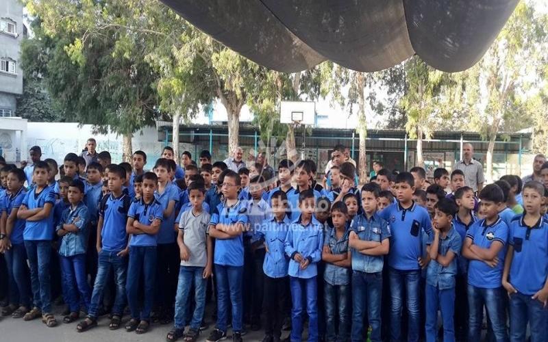 بالصور: وقفة احتجاجية بالبريج ضد قرارات "الأونروا"