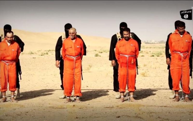 بالصور: "داعش" تشوي 4 أشخاص على أرجوحة‎