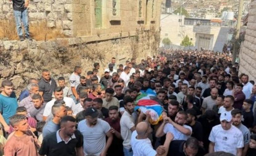 تشييع جثمان الشهيد الفتى كريم شلالدة في سعير شمال شرق الخليل