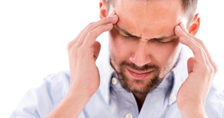 Man-experiencing-pain-from-frequent-headaches-630x400
