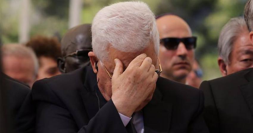 عباس في جنازة بيريز