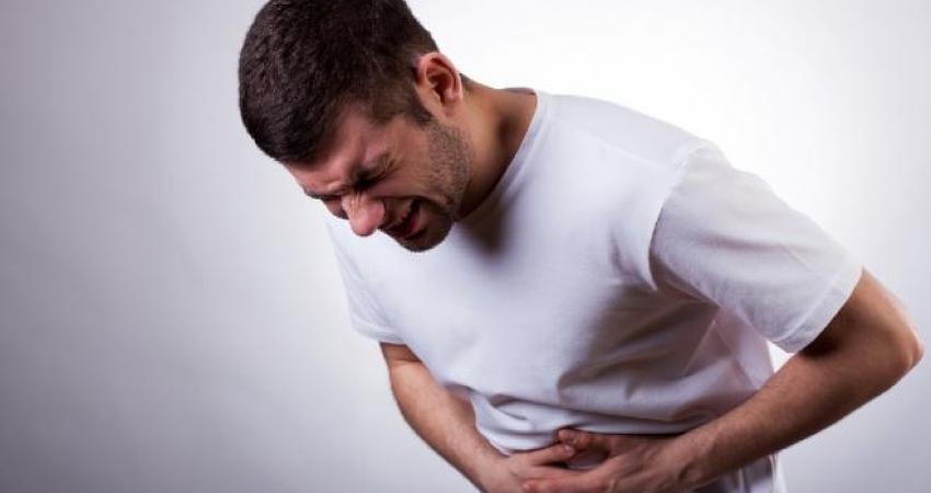 bigstock-man-with-stomachache-60360944
