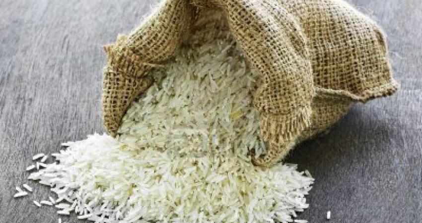 6121221-raw-long-grain-white-rice-grains-in-burlap-bag