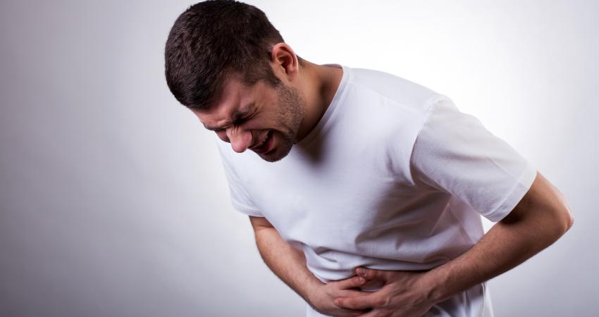 bigstock-Man-With-Stomachache-60360944