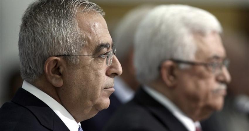 عباس وسلام فياض