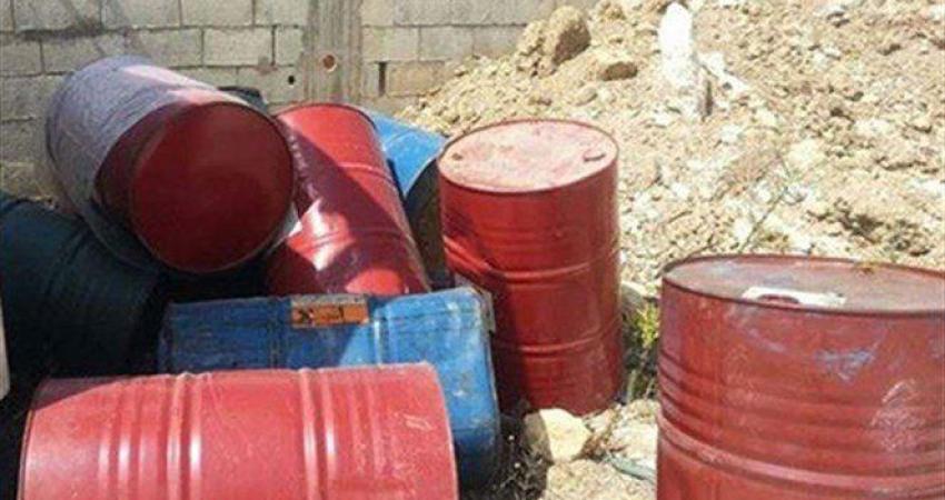 ضبط براميل مواد كيماوية بالخليل