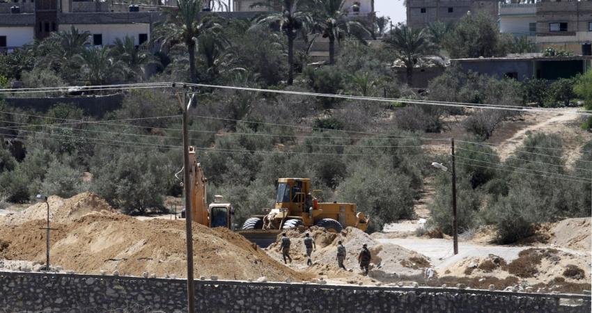 A-view-of-soldiers-from-the-Egyptian-army-destroying-the-infraestructure-of-smuggling-tunnels-along-the-EgyptGaza-border-is-seen-from-Rafah