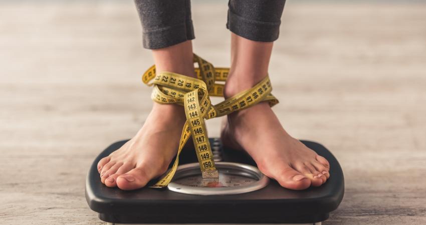 weight-loss-diet-concepts-weighing-scales-yellow-measuring-tape