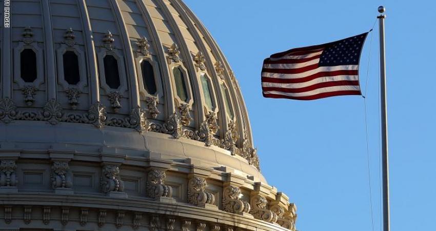 The last rays of sunlight fall on the dome of the U.S. Capitol 
