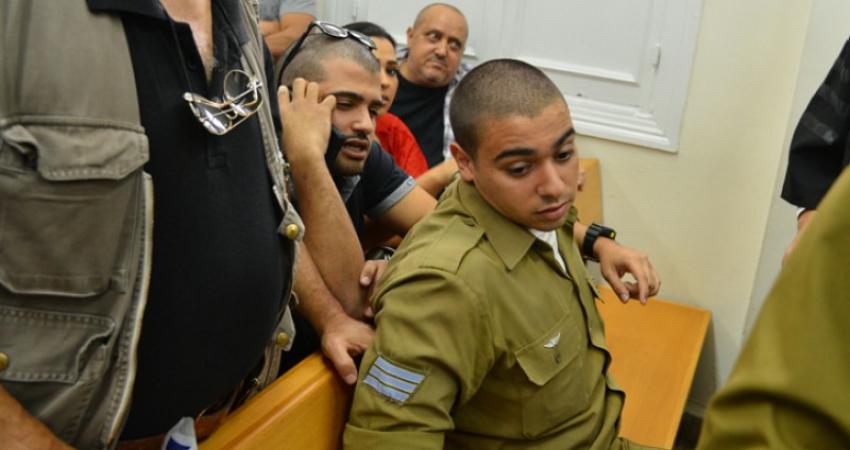 الجندي قاتل الشهيد الشريف