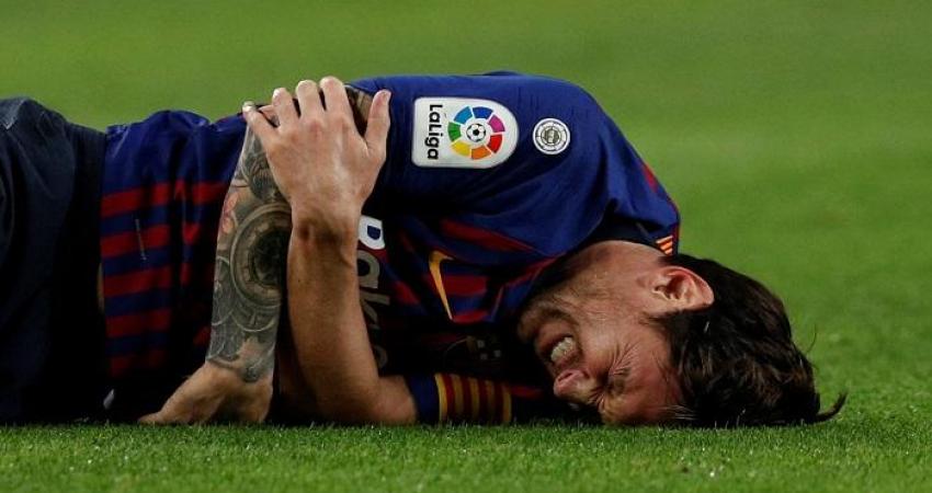 124-000439-messi-injury-against-sevilla_700x400