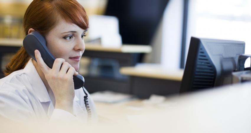 female-receptionist-talking-on-phone-1