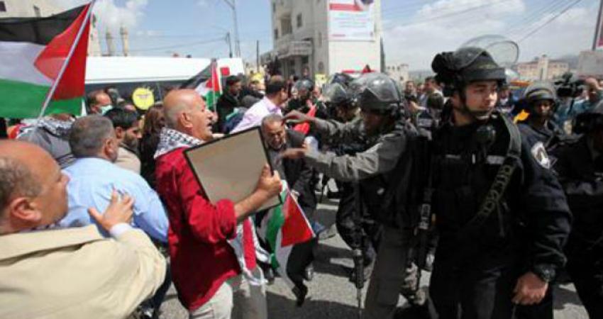 عشرات الإصابات في قمع الاحتلال لمسيرة "يوم الأرض" بنابلس