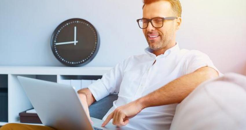 casual-man-relaxing-using-laptop-stock-photo-04