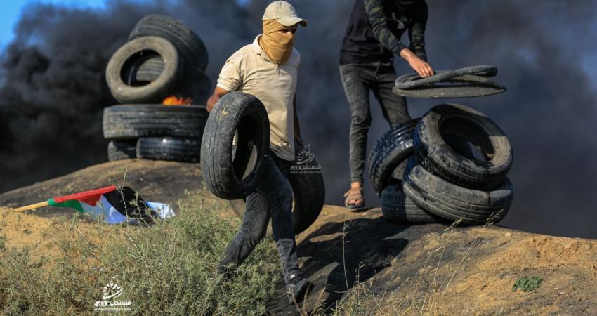 إشعال الإطارات المطاطية شرق غزة تضامناً مع جنين