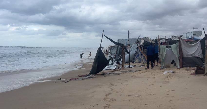 tents damaged gaza sea.jpg