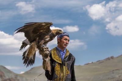 https___blogs-images.forbes.com_annabel_files_2018_12_Mongolia-Eagle-Hunter_Emily-Wilson_DanitaDelimont.com_-1200x800